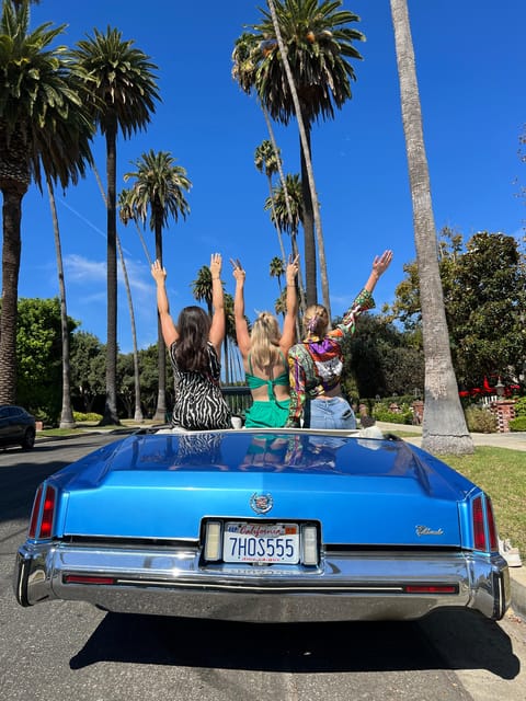 Discover LA in a 1973 Cadillac Eldorado convertible - The Hollywood Sign from a scenic viewpoint